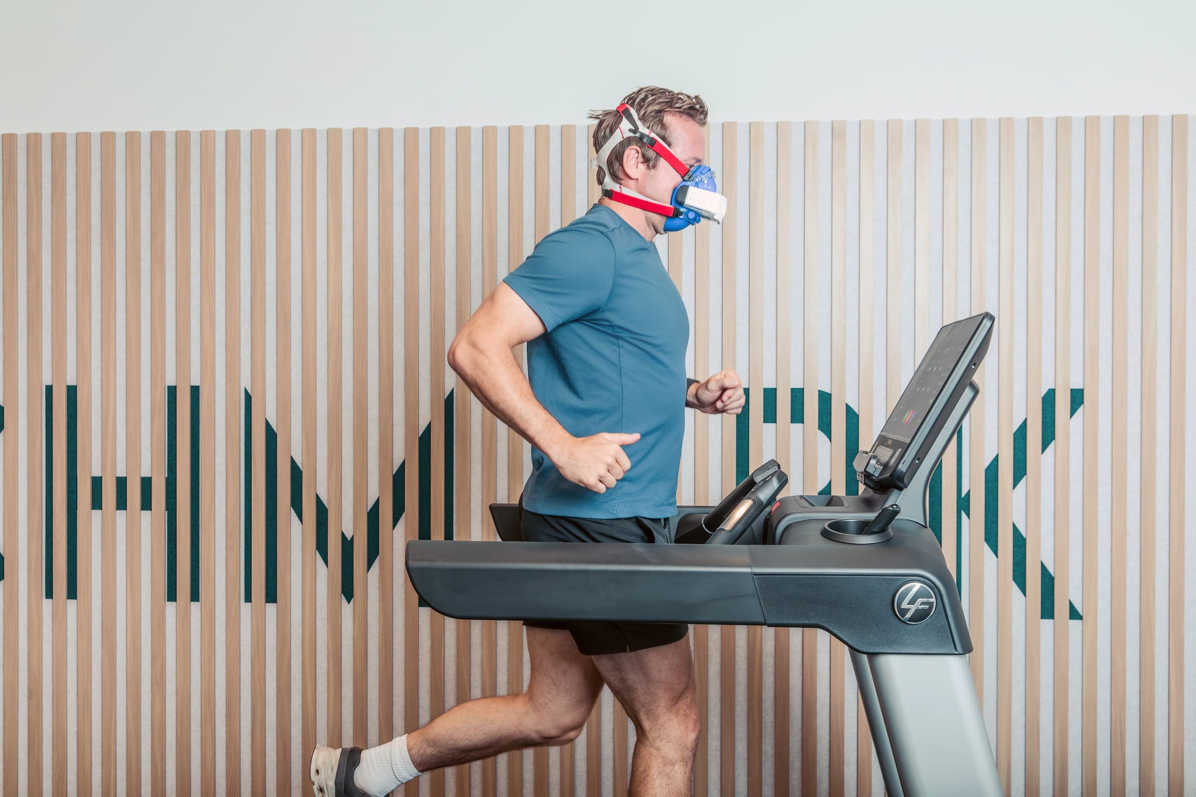 Member completing a guided VO2 max treadmill assessment