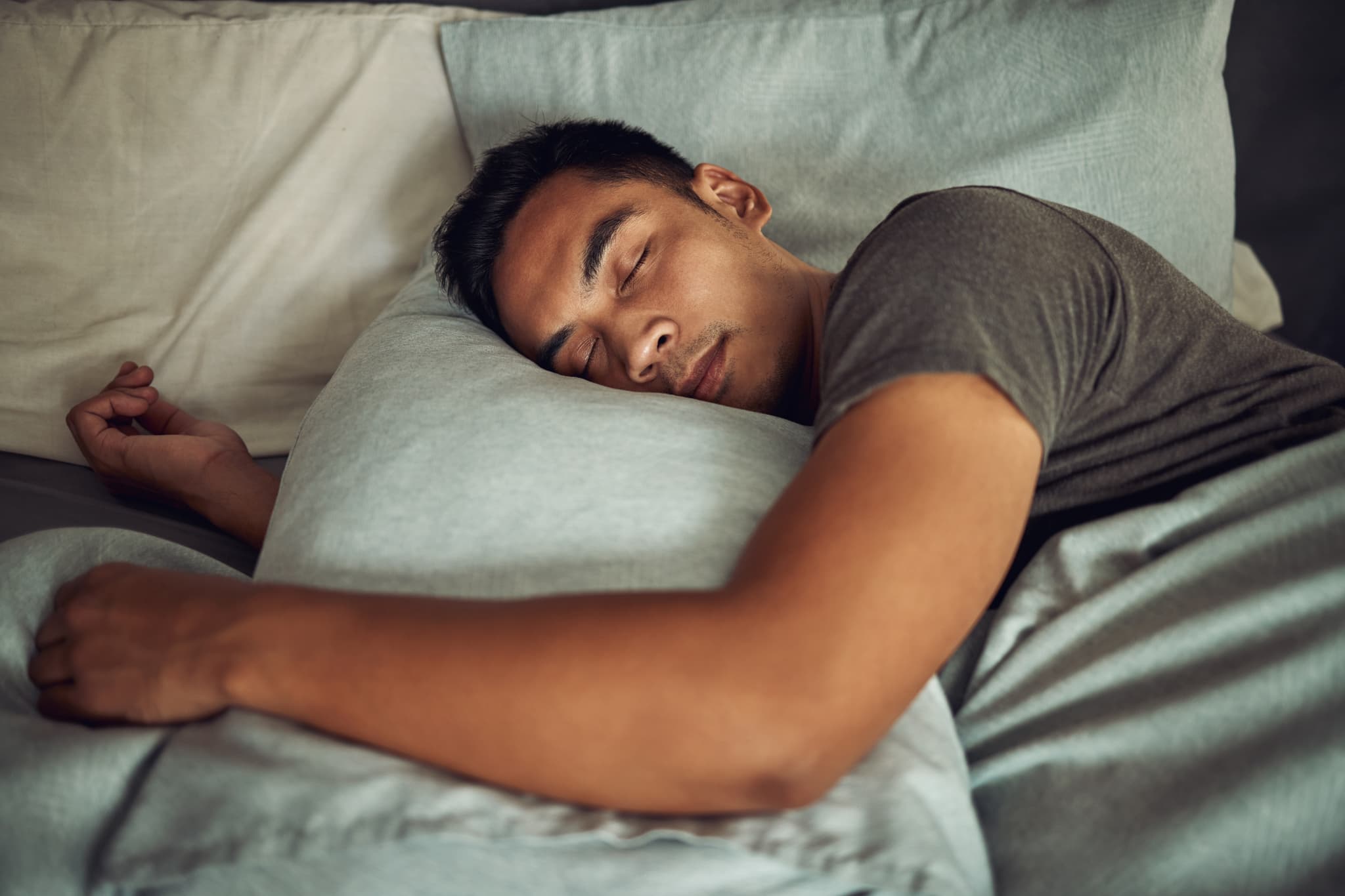 Person sleeping in bed